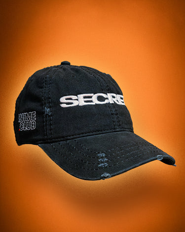 Black cap with 'SECRET ANIME CLUB' text on an orange background