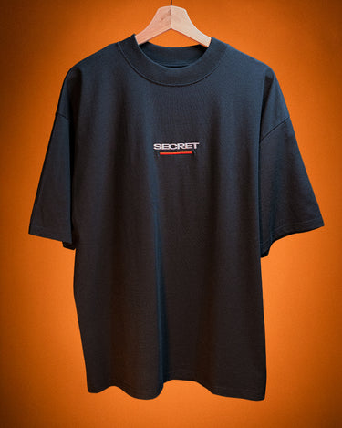 Black Secret Anime Club  t-shirt with 'SECRET' logo on an orange background